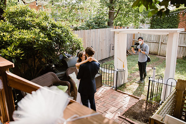 Filmmaker at work capturing wedding moments